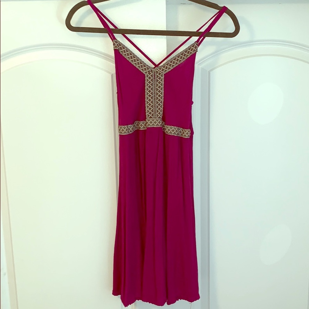 Raspberry dress with black and white design